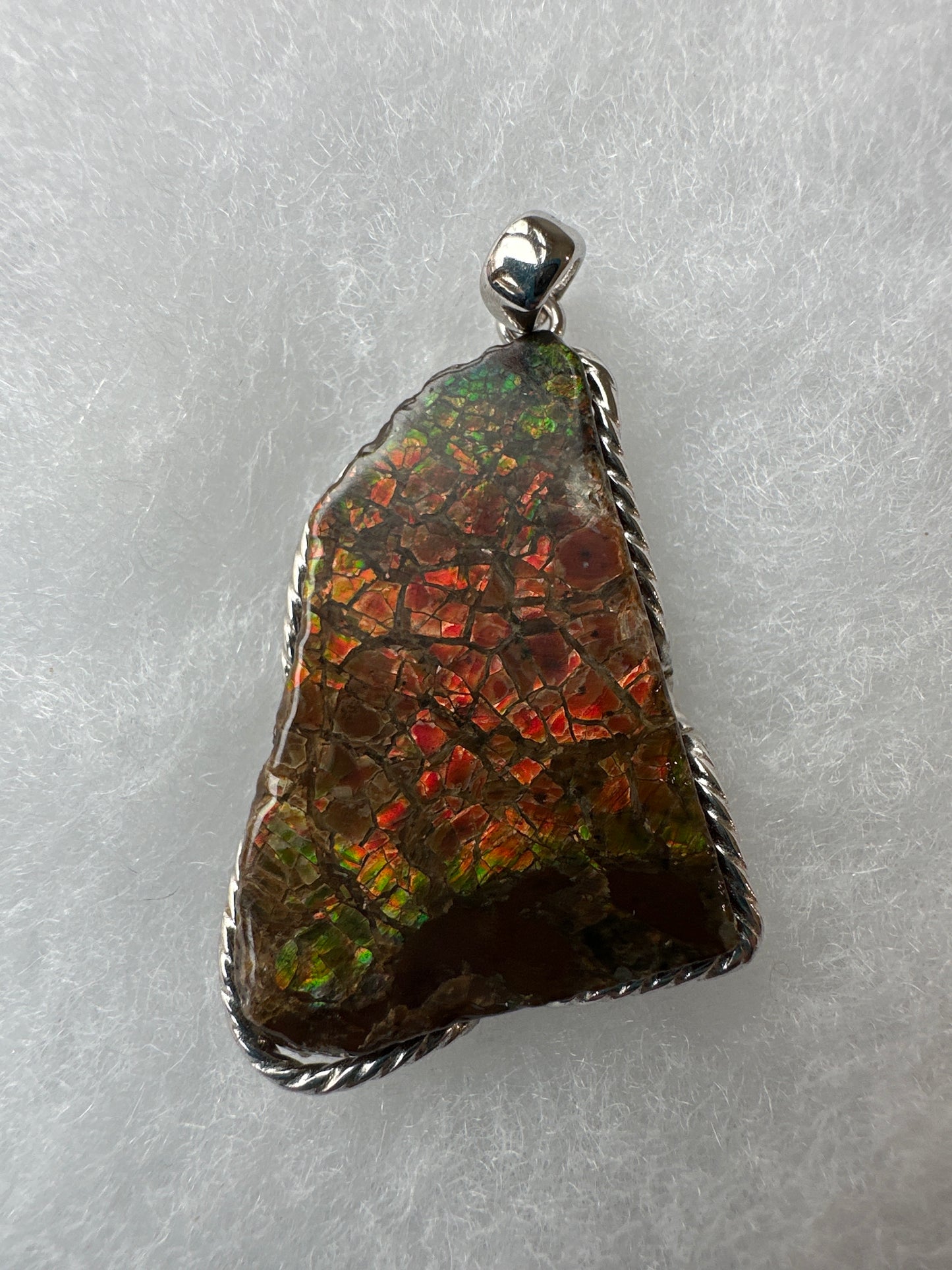Ammolite pendant, in silver