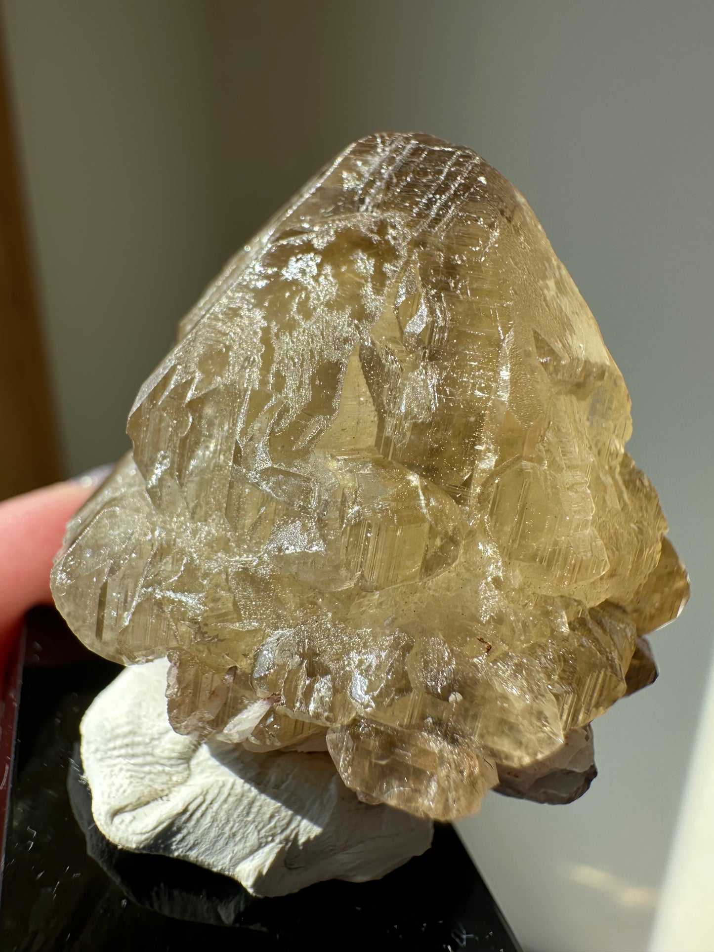 Cerussite: etched point with phantoms