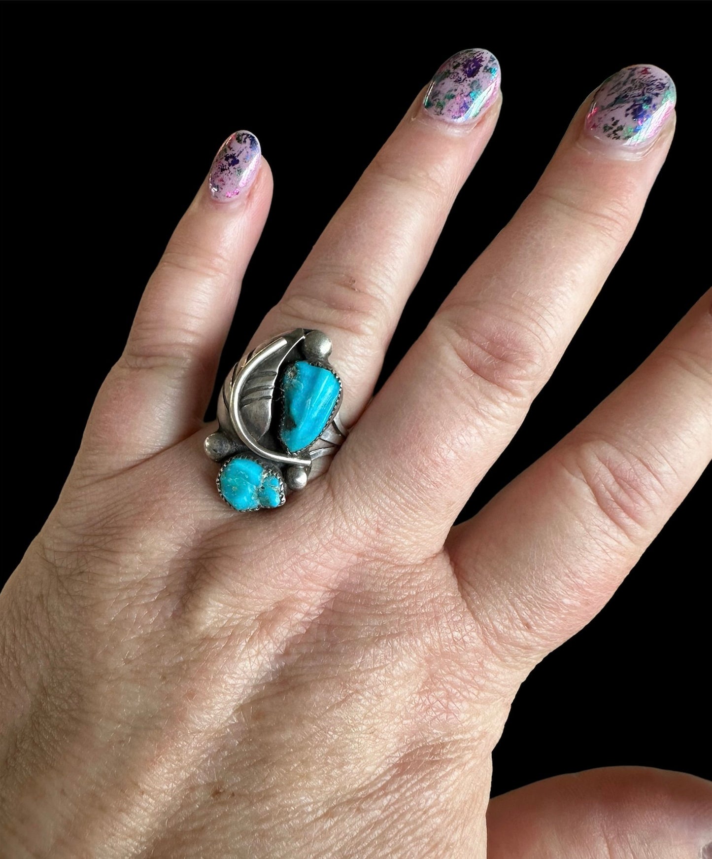 Vintage artisan-made Turquoise ring. set with silver leaves. sz. 8