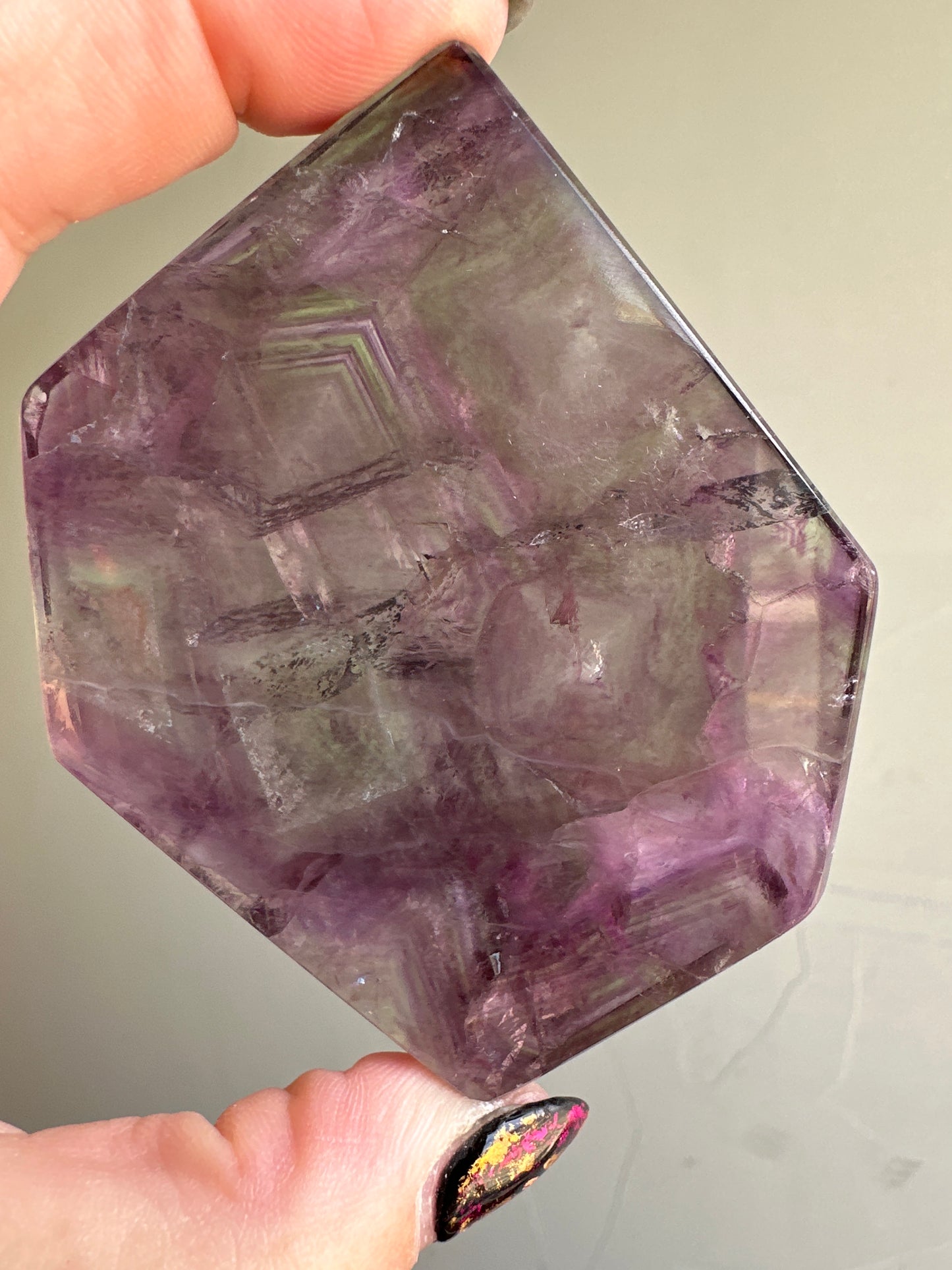 polished mostly purple Fluorite slab with stand