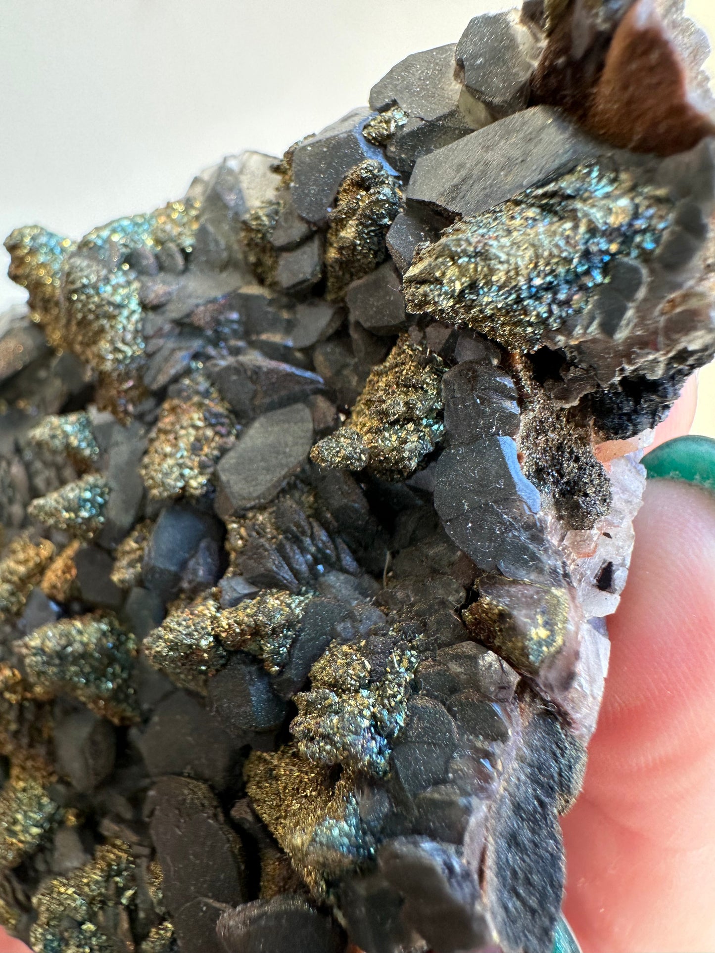Black pagoda calcite w/iridescent chalcopyrite