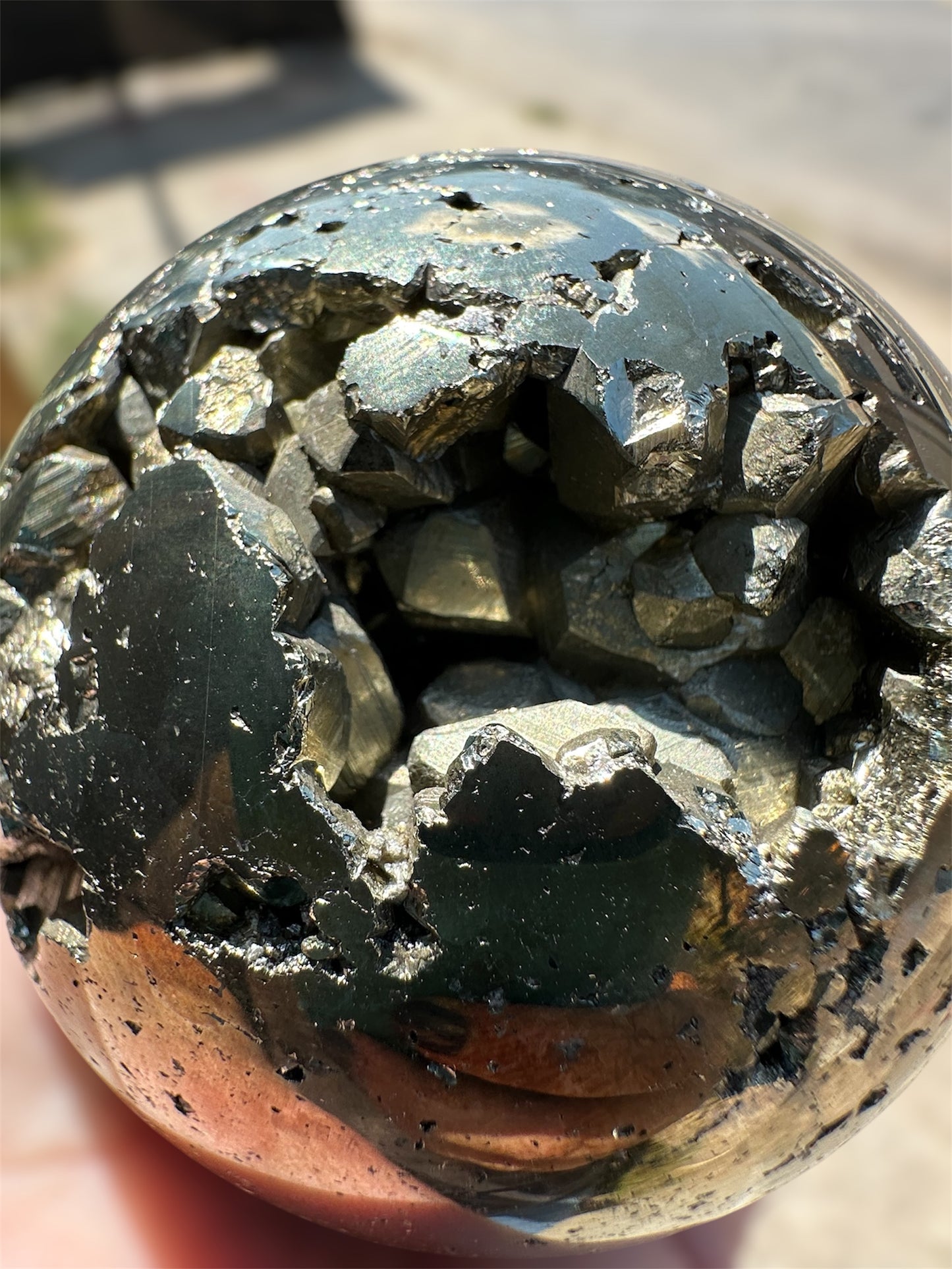 Pyrite sphere, partially polished