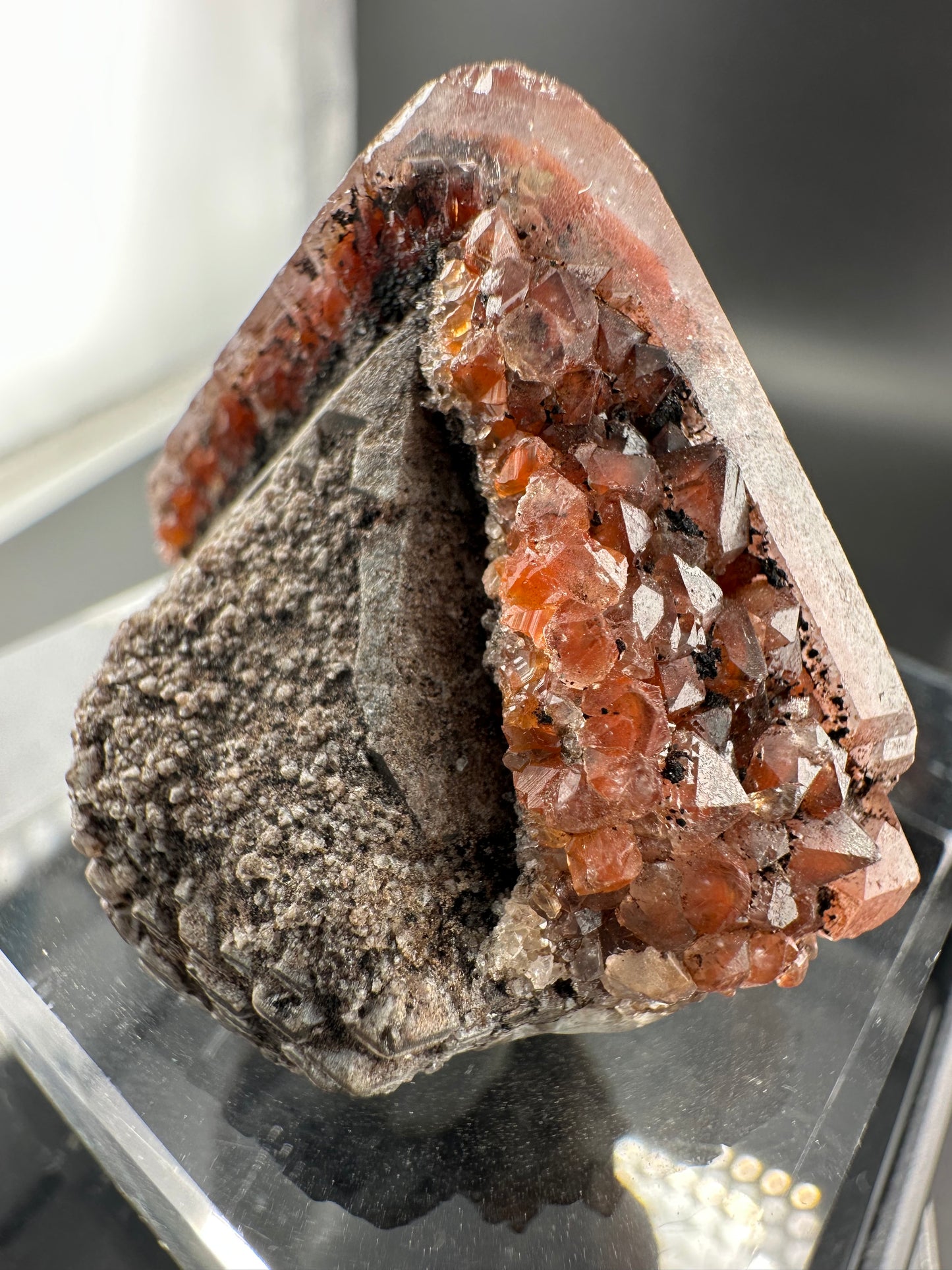 hematite-included Quartz point with secondary growth, Brazil