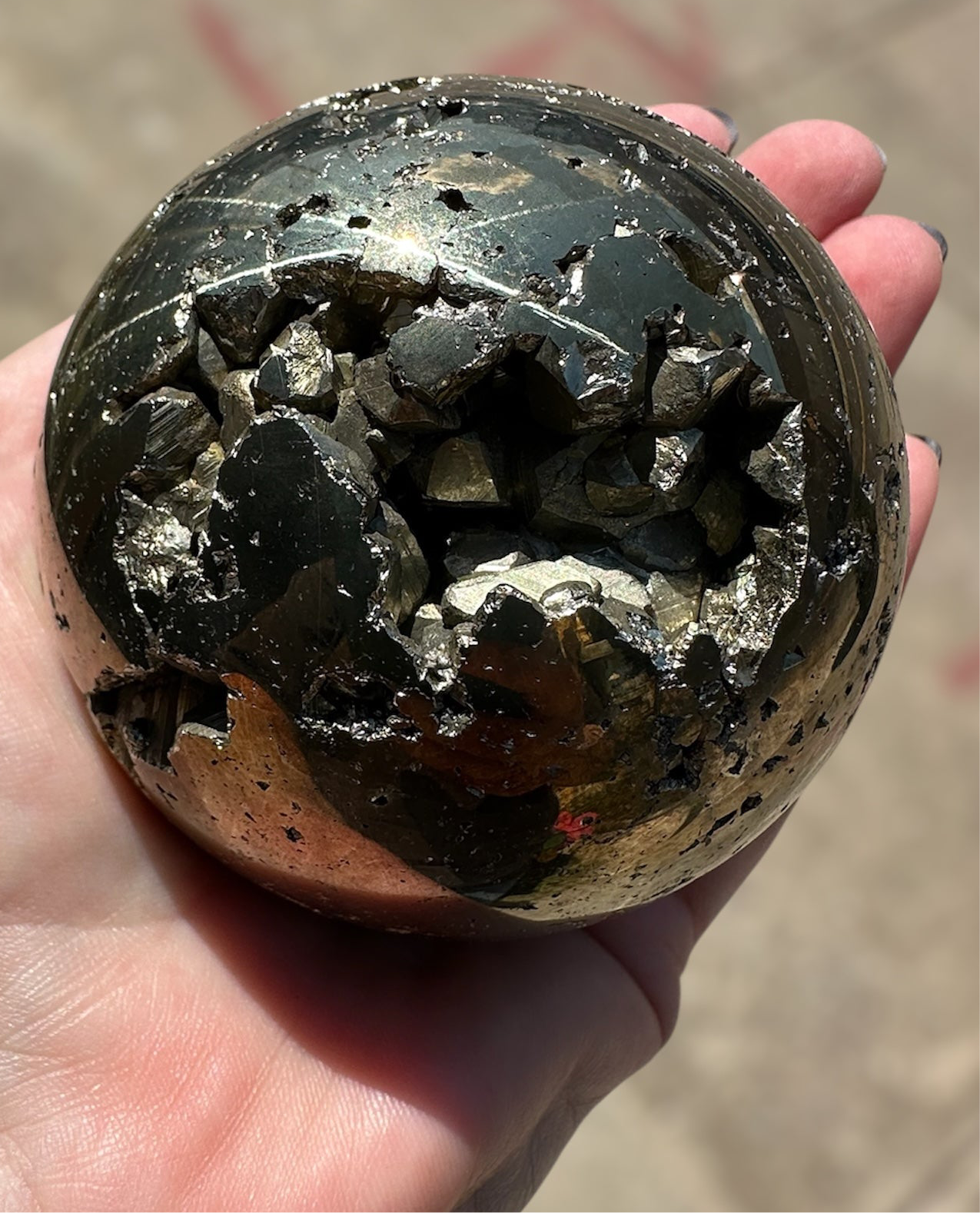 Pyrite sphere, partially polished