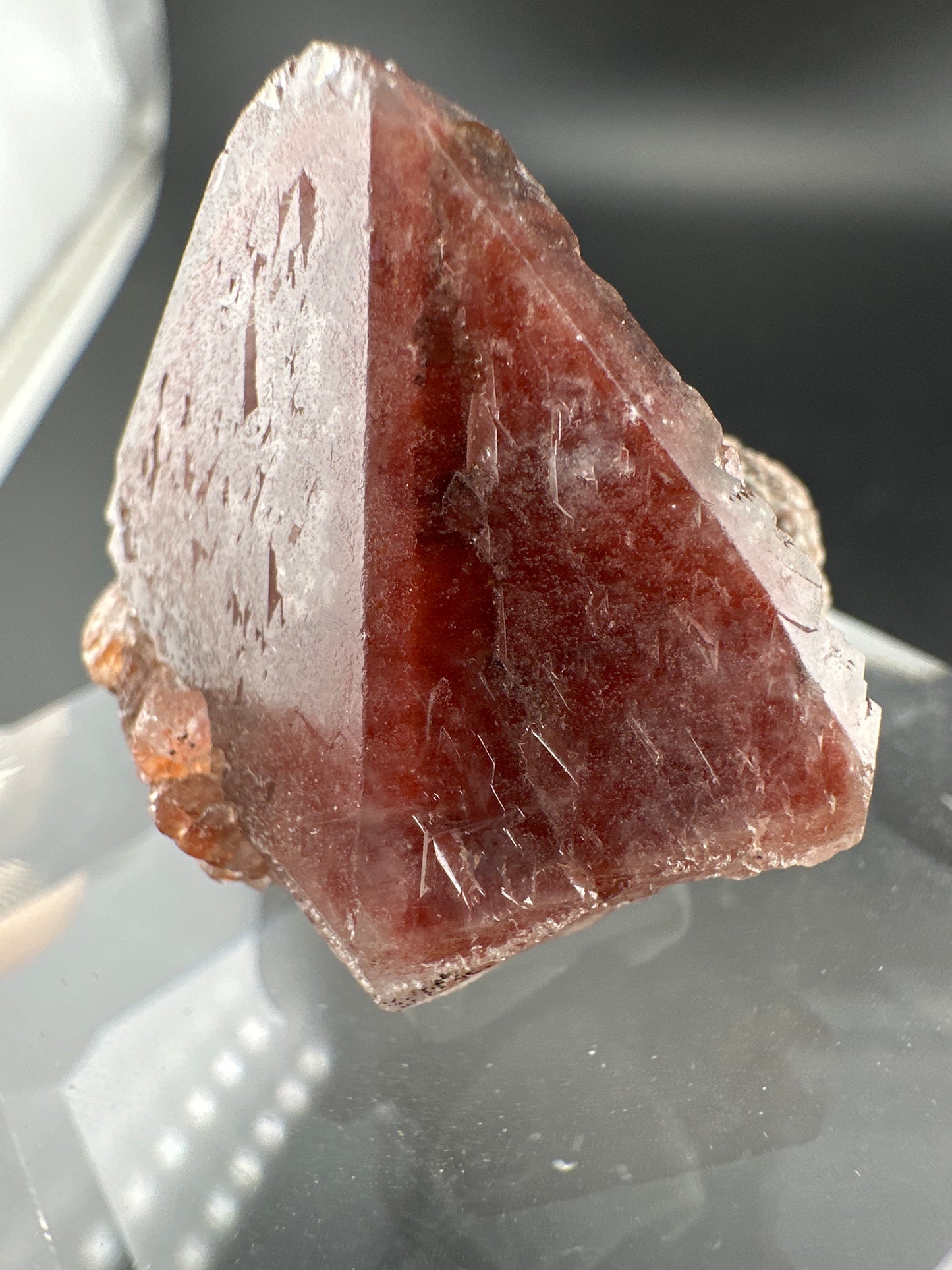 hematite-included Quartz point with secondary growth, Brazil