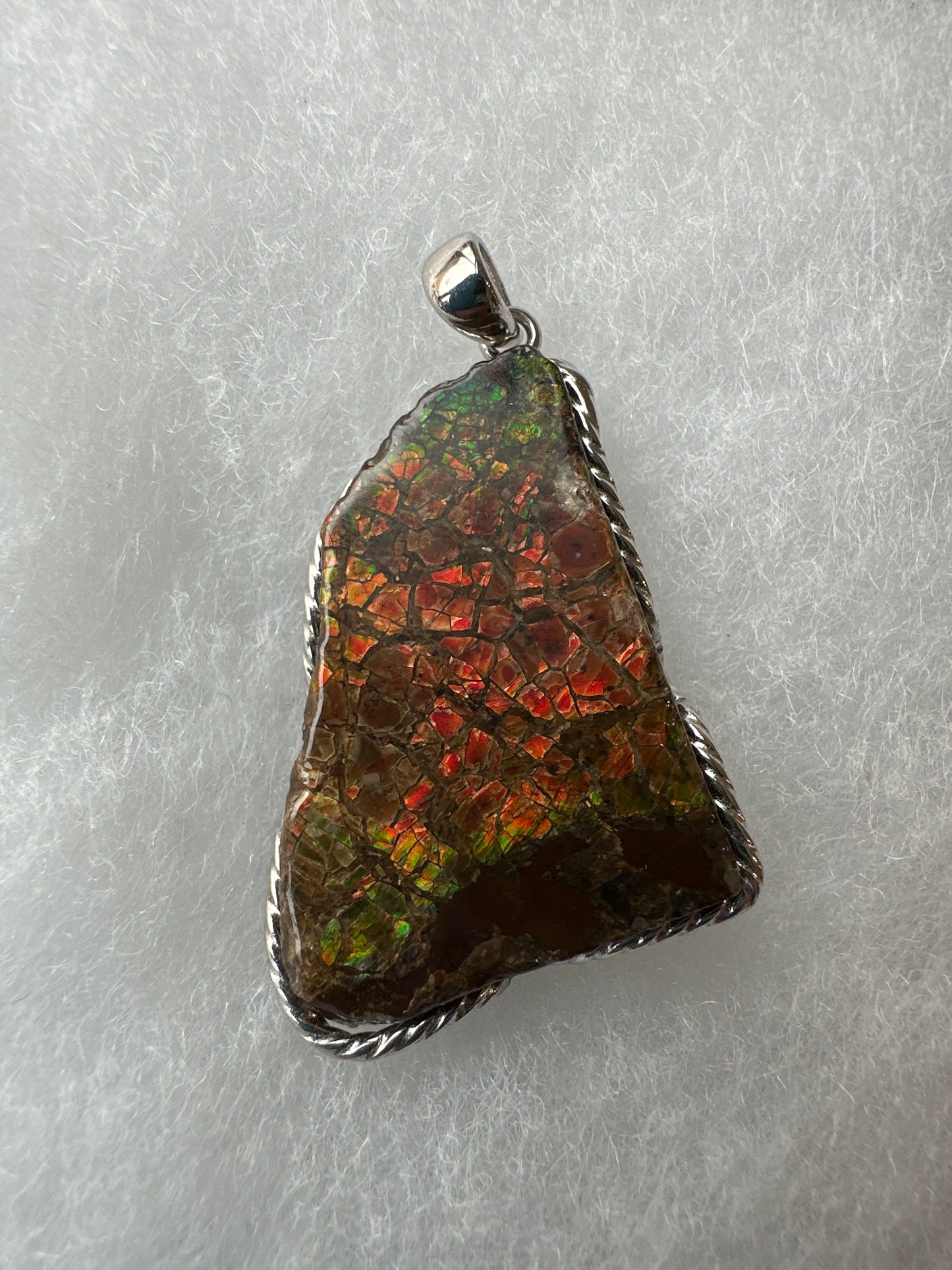 Ammolite pendant, in silver