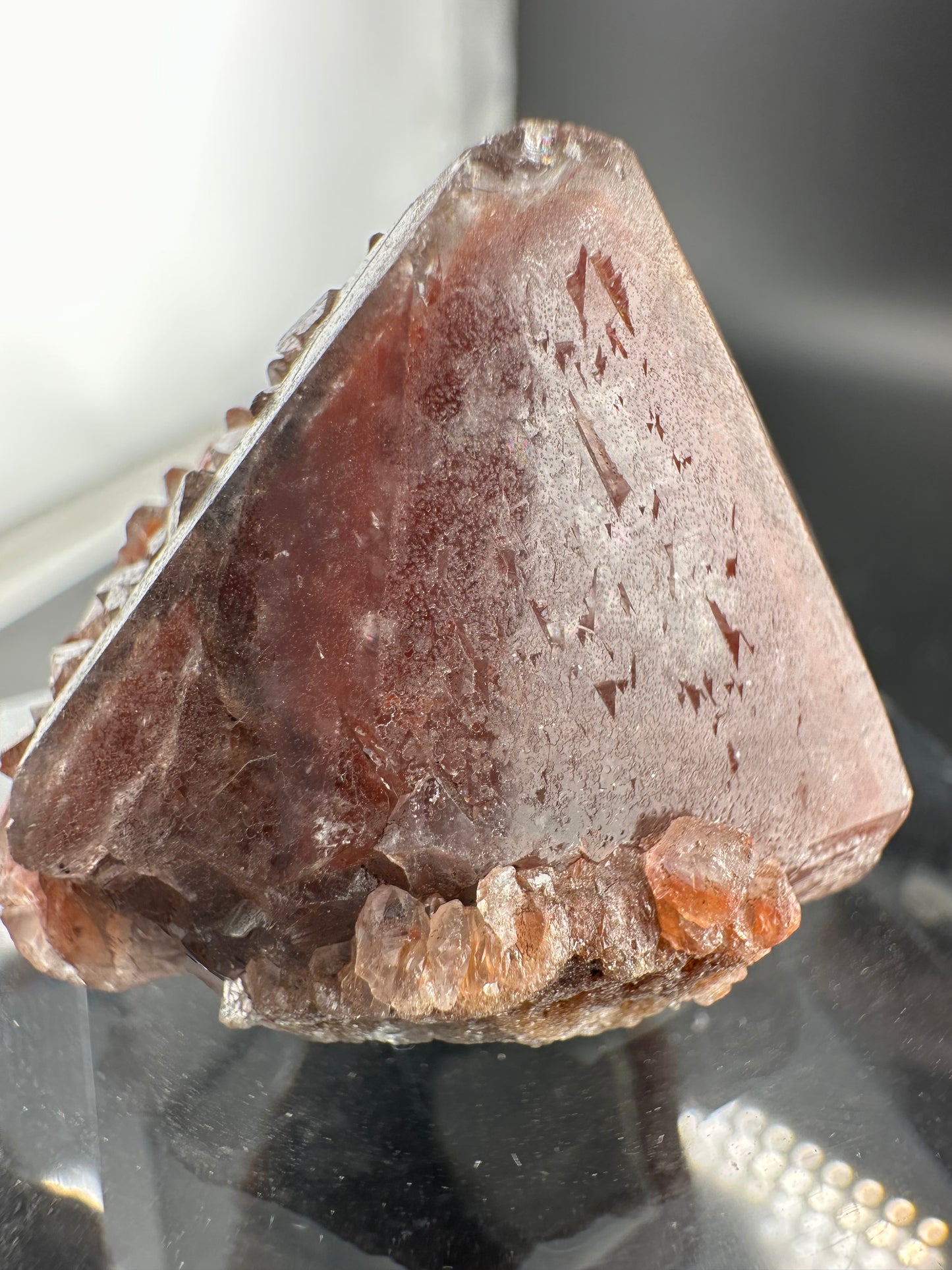 hematite-included Quartz point with secondary growth, Brazil
