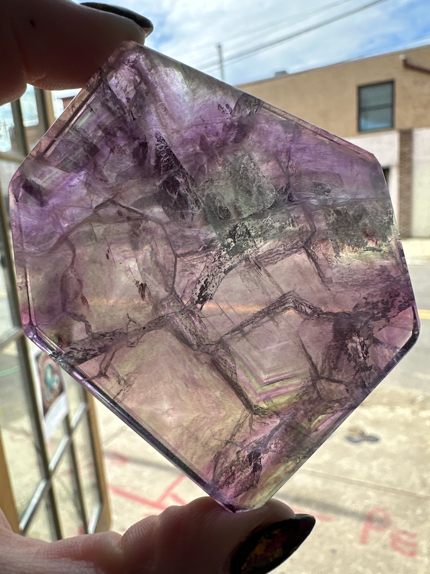 polished mostly purple Fluorite slab with stand