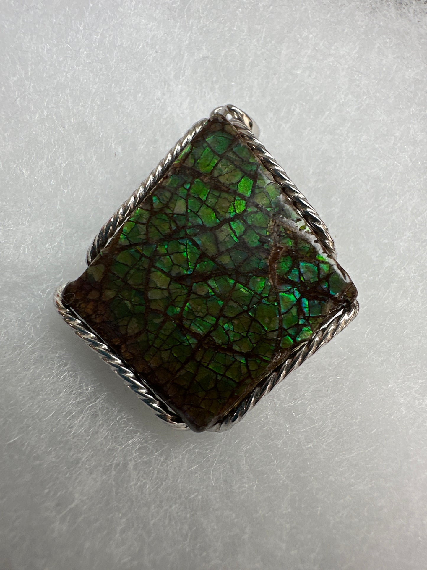 Ammolite pendant, in silver