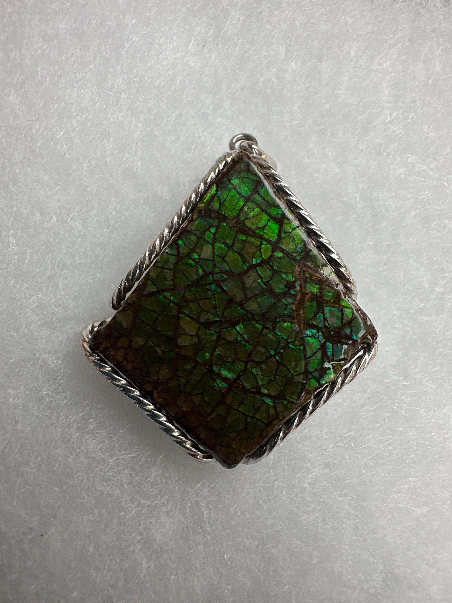 Ammolite pendant, in silver