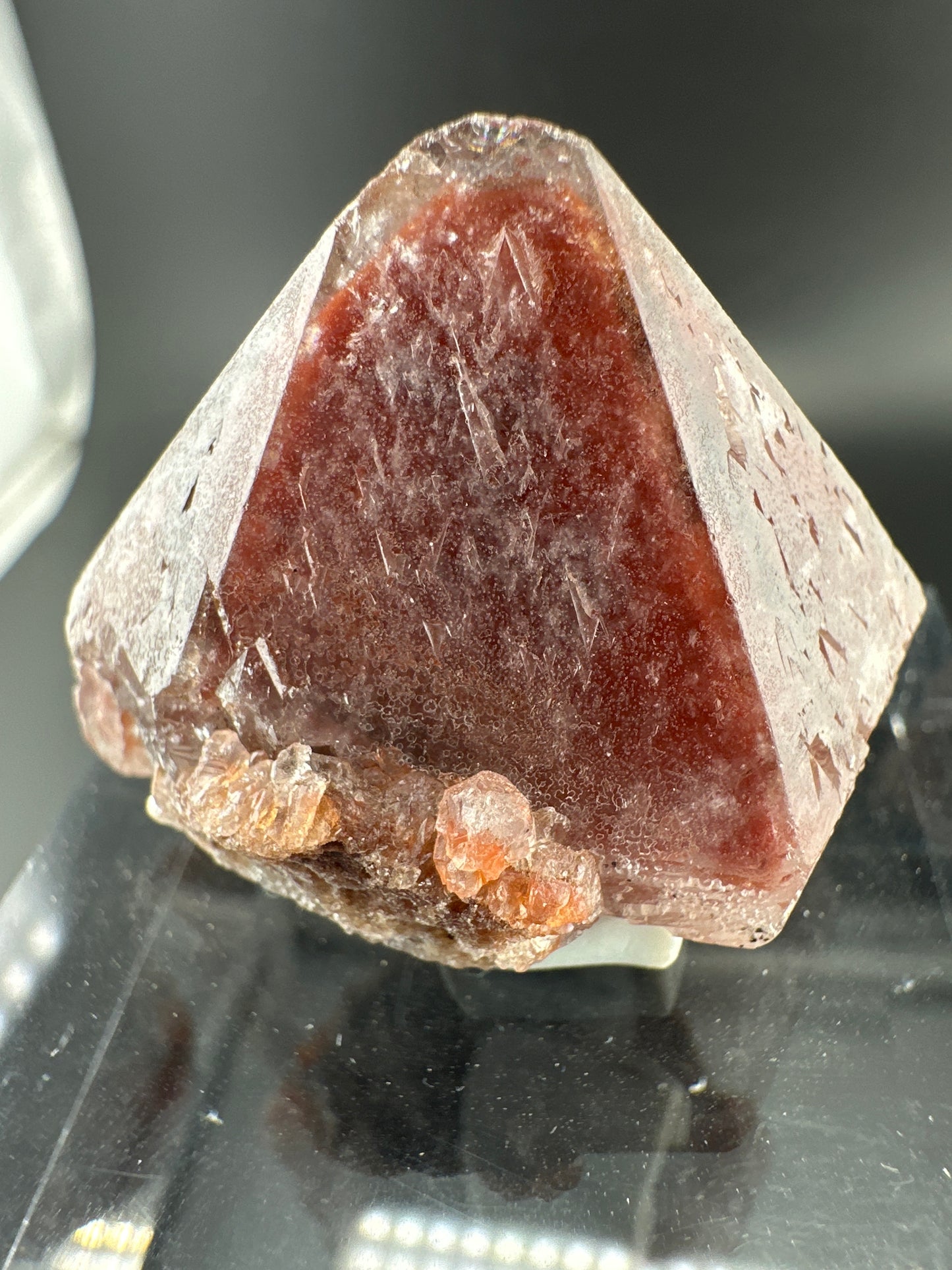 hematite-included Quartz point with secondary growth, Brazil