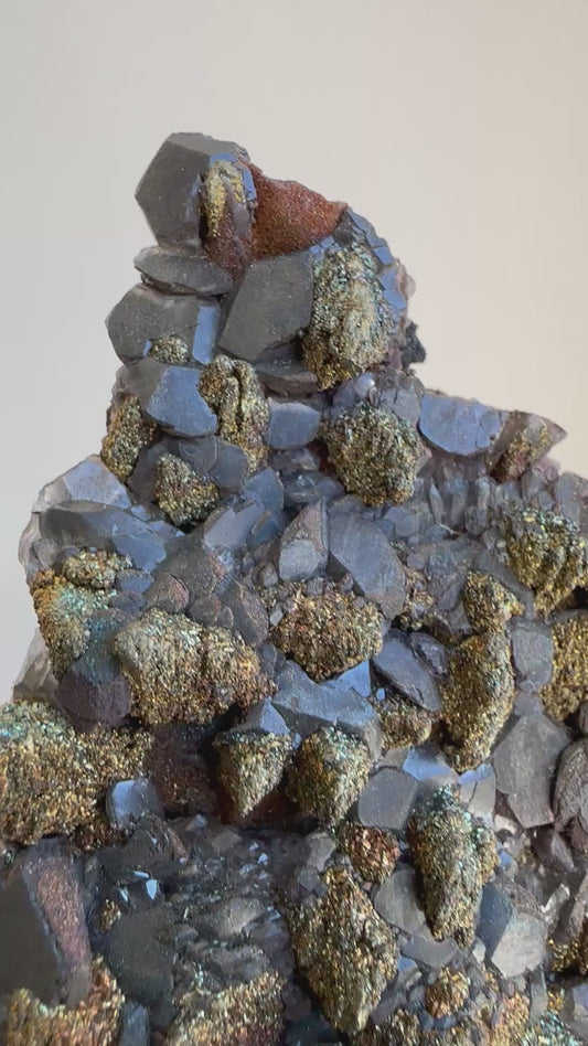Black pagoda calcite w/iridescent chalcopyrite